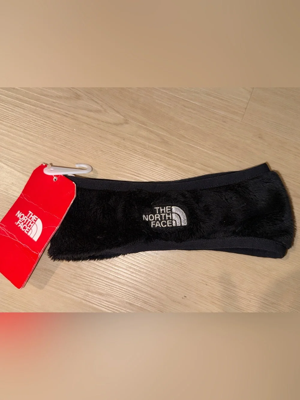 The North Face Black Fleece Ear Warmer Headband—youth